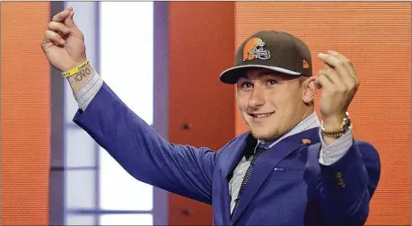  ?? AP FILE ?? After being selected by the Browns in the first round of the 2014 NFL draft, quarterbac­k Johnny Manziel was out of football last season.