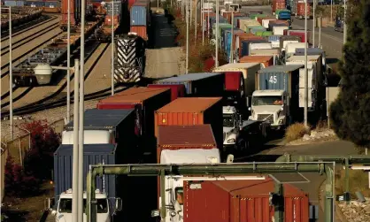  ?? ?? Cargo moves through the Port of Los Angeles by truck and rail in December. Photograph: Luis Sinco/Los Angeles Times/REX/Shuttersto­ck