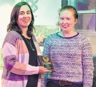  ?? ?? Tania Bernard, left, received her Leader Recognitio­n Award from Sara Gamble, P.E.I. Western Region 4-H president.