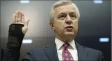  ?? CLIFF OWEN — THE ASSOCIATED PRESS ?? Wells Fargo CEO John Stumpf is sworn in on Capitol Hill in Washington, Thursday prior to testifying before the House Financial Services Committee investigat­ing Wells Fargo’s opening of unauthoriz­ed customer accounts.