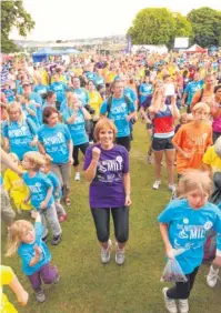  ??  ?? Crowds will gather in Rochester Castle gardens and start warming up for their run