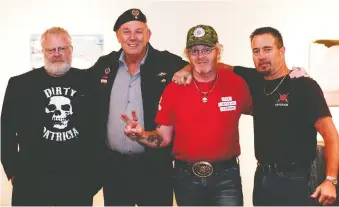  ?? OWEN HART FOUNDATION. ?? Pictured, from left, are guests of the foundation, veterans Jerry Peddle, Johann Jeppe, Todd Gilman and Alain Habel.