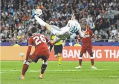  ??  ?? Gareth Bale launches himself to score Real Madrid’s second goal.