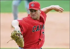  ?? THE CANADIAN
PRESS ?? Rheal Cormier pitches during Canada’s win over China at the 2008 Olympics in Beijing. Cormier pitched in the Olympics before and after his time in the big leagues.