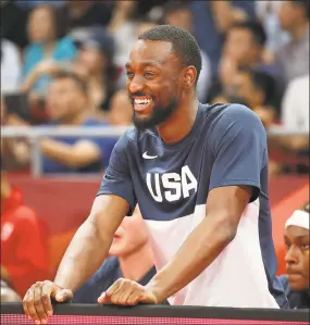  ?? Lintao Zhang / Getty Images ?? Kemba Walker reacts during Saturday’s World Cup game between the U.S. and Poland.