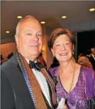  ??  ?? Jim Kroll of Radnor and wife Betsy arrive at the reception.