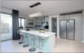  ??  ?? HEARTH: This kitchen is in a five-bedroomed home, in Stonehurst Mountain Estate, Steenberg, that is for sale at R10.5 million.