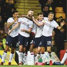  ??  ?? FALSE DAWN: Bolton’s Mark Beevers celebrates his leveller