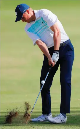  ??  ?? Jordan Spieth plays a shot during the first round of the Sony Open in Hawaii