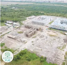  ??  ?? Aerial view of Amber Vue apartment project in progress.