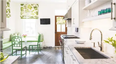  ??  ?? Shades of blue were popular in 2018; green is trending this year. Above, a breakfast nook designed by Meyer in a kitchen by Aidan Design.