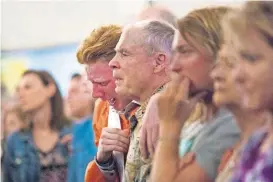  ?? [MARIE D. DE JESUS/HOUSTON CHRONICLE VIA THE ASSOCIATED PRESS] ?? Nathan Jordan, 18, a senior student at Alvin High School, sobs during a Sunday service at the Arcadia First Baptist Church, two days after a shooting that killed 10 people at the Santa Fe High School in Santa Fe, Texas.