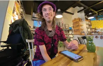  ?? ?? Sira Rehn, a user of ‘DigiVi’, a dating app developed exclusivel­y for people with mild intellectu­al disabiliti­es or autism, poses for a photo at a cafe in Uppsala, Sweden.