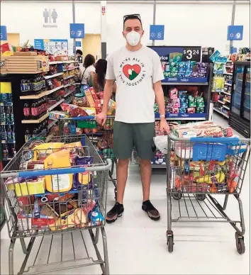  ?? Louis Goffinet / Contribute­d photo ?? Mansfield Middle School teacher Louis Goffinet makes one of his dozens of grocery runs during the height of the pandemic.