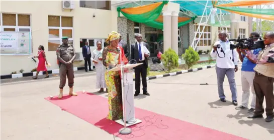  ?? PHOTO
ABUBAKAR YAKUBU ??   
FCT Minister of State Oloye Olajumoke Akinjide commission­ing the entreprene­urial complex of Abuja Enterprise Agency in Abuja yesterday.