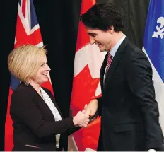  ?? ADRIAN WYLD/THE CANADIAN PRESS ?? Prime Minister Justin Trudeau said Alberta Premier Rachel Notley’s climate change strategy, which includes a carbon tax and phasing out coal-fired plants, is a ‘fresh and new’ approach.