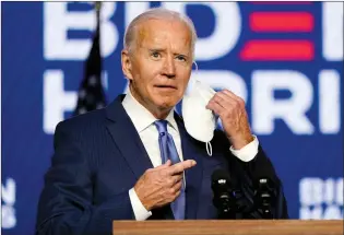  ?? AP PHOTO CAROLYN KASTER ?? Democratic presidenti­al candidate Joe Biden arrives to speak Friday in Wilmington, Del.