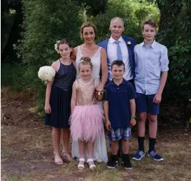  ??  ?? On their wedding day last year, Jo Cordner and Mark Pedersen were surrounded by their children Emma, 12 (left), Stefan, 15 (right), and (in front) Alyssa, 7, and Joshua, 9.