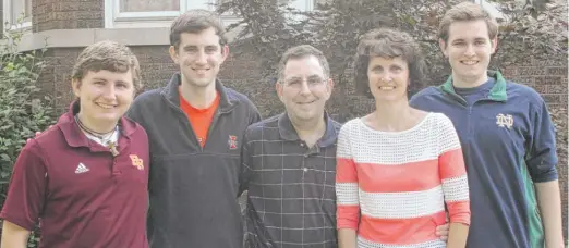  ?? PROVIDED PHOTOS ?? Meg and John Rooney (center) and their children (from left) Dan, Ned and Jack. John Rooney died of ALS less than four years ago.