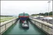  ?? XINHUA ?? A Chinese container ship passes through the Panama Canal during the opening ceremony for a new lock in 2016.