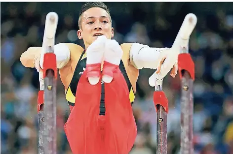  ?? FOTO: REUTERS ?? Harte Arbeit am Barren: Marcel Nguyen bei Olympia 2012 in London.