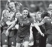  ?? Martin Rose / Getty Images ?? Norway’s Ingrid Engen, center, celebrates after her winning penalty kick against Australia.