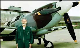  ??  ?? ‘DISGRACE’: Former pilot Kenneth Morris with a Spitfire that he flew in 2000