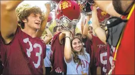  ?? MEL MELCON Los Angeles Times ?? LA CAÑADA kicker Shaina Clorfeine, 17, says she feels comfortabl­e as a member of the football team. “I hope people see what an amazing story I’ve had,” she says.