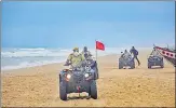  ?? PTI ?? Marine police patrol Puri beach to prevent people from venturing into the sea due to Cyclone Amphan on Sunday.