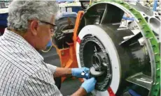  ?? — Reuters ?? A worker is seen building an aircraft engine at Honeywell Aerospace in Phoenix, Arizona, US.