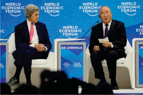  ?? (AP) ?? US and Chinese c l imate envoys John Kerry and Xie Zhenhua in Davos ear l ier this year