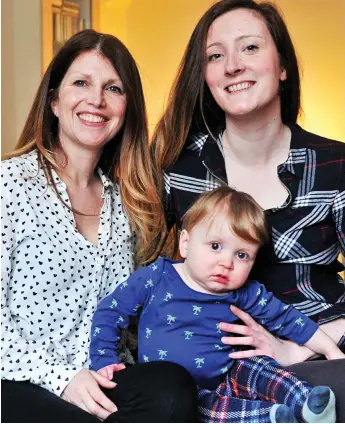  ??  ?? Call on me: Midwife Nicky Hennell, left, with Nicole Tierney and her son Austin