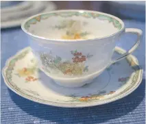  ??  ?? A teacup and saucer from a set of dishes Patricia Crowe’s father and sister gave to her grandmothe­r. If one of the pieces breaks, her father said, remember it is just a dish.