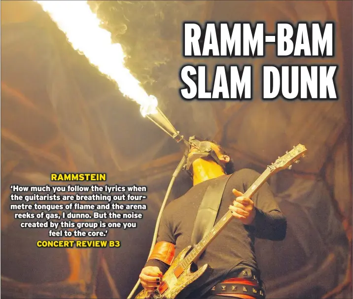  ?? IAN LINDSAY — PNG ?? German industrial metal band Rammstein, here with guitarist Paul Landers shooting flames, put on an ‘awesome show’ for their fans Sunday in Vancouver, opines The Province’s reviewer, Stuart Derdeyn.