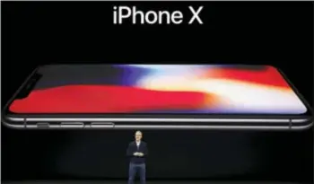  ?? MARCIO JOSE SANCHEZ — THE ASSOCIATED PRESS ?? Apple CEO Tim Cook announces the new iPhone X at the Steve Jobs Theater on the new Apple campus, Tuesday in Cupertino.