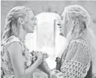  ?? JONATHAN PRIME/UNIVERSAL PICTURES ?? Amanda Seyfried and Meryl Streep share an emotional duet in the sequel ”Mamma Mia! Here We Go Again.”