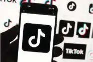  ?? AP PHOTO/MICHAEL DWYER ?? The TikTok logo is shown on a cellphone on Oct. 14 in Boston.