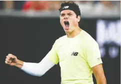  ?? DANIEL POCKETT / GETTY IMAGES ?? Milos Raonic of Canada celebrates after winning his men’s singles third-round match against Stefanos Tsitsipas of Greece at the 2020 Australian Open.