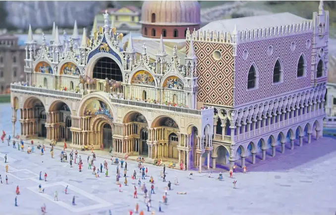  ?? PHOTOS BY AFP ?? A miniature model of the Piazza San Marco in Venice, Italy.
