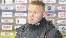  ?? Jacques Feeney / Getty Images ?? Derby manager Wayne Rooney said he was surprised at the reaction of fans when players showed support for a movement trying to fight racism.