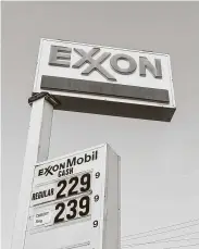  ?? SOPA Images / LightRocke­t via Getty Images ?? Exxon on Tuesday joined other large oil companies in reporting massive losses in the fourth quarter.