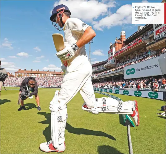  ?? AFP ?? England’s Alastair Cook runs out to open the batting in his final innings at The Oval yesterday.