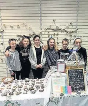  ??  ?? Pupils from Oldcastle Primary School, Bridgend, opened a pop-up shop in the Rhiw Shopping Centre as part of an enterprise project