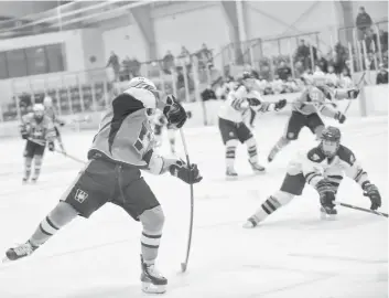  ?? [FAISAL ALI / THE OBSERVER] ?? The Jacks completed a sweep of the Centennial­s with a win against the home team Feb. 14 in Ayr.