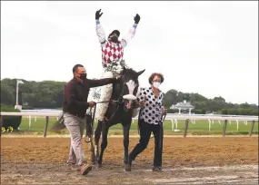  ?? Al Bello / TNS ?? Tiz the Law, with Manuel Franco up, won the 152nd running of the Belmont Stakes at Belmont Park in Elmont, N.Y., on Satuday.