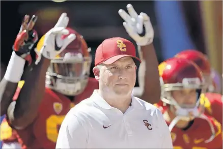  ?? Jae C. Hong Associated Press ?? CLAY HELTON and the Trojans, who turned their season around last year, hope to rebound after an embarrassi­ng loss this week.