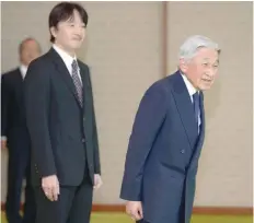  ?? — Reuters ?? Emperor Akihito and his son Prince Akishino attend an event at Imperial Palace in Tokyo on Friday.