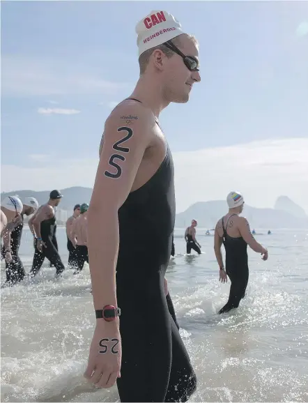  ?? — JASON RANSOM ?? Canada’s Richard Weinberger placed 17th in the ultracompe­titive marathon swim Tuesday in Rio de Janeiro. The top-three swimmers were separated by less than half a second.