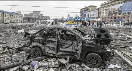  ?? PAVEL DOROGOY/ASSOCIATED PRESS ?? A view of the central square shows the damage Tuesday following the attack in Kharkiv, Ukraine’s second-largest city. It wasn’t immediatel­y clear what type of weapon was used, and the Russian military has denied deliberate­ly targeting civilians.