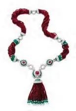  ??  ?? Cross River tassel necklace